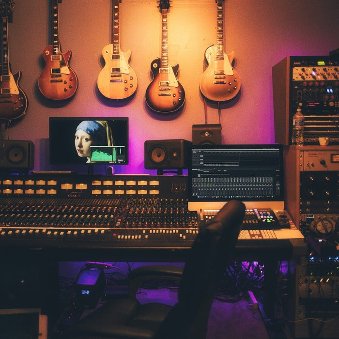 Studio workstation with a soft synth open mid-patch during a subtractive synthesis session