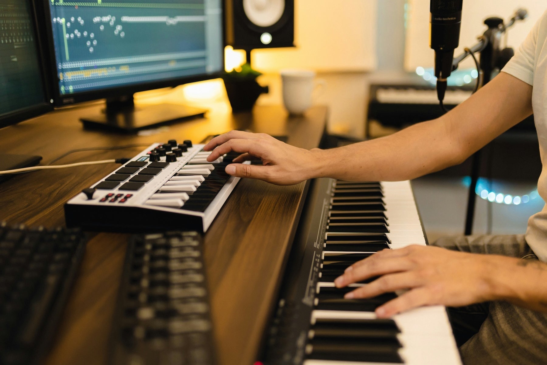Producer programming individual drum one-shots on a hardware pad controller