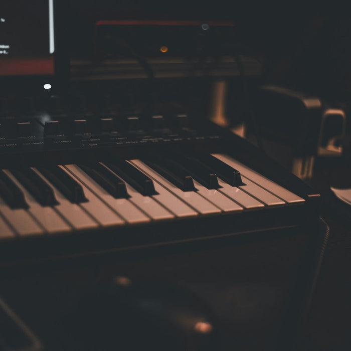 Producer routing channels to reverb send returns in a DAW mixer view