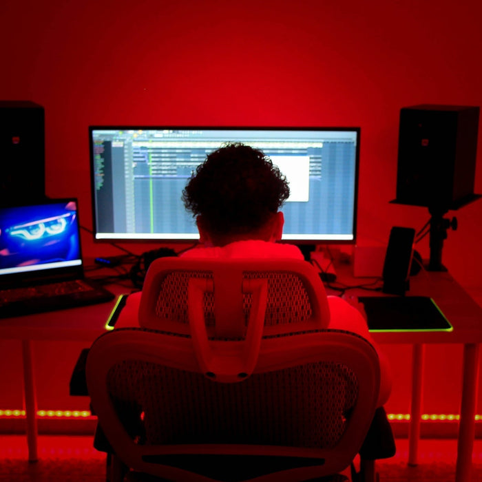 Producer adjusting groove and swing settings on an MPC-style drum pad controller